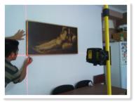 colgar cuadros con nivel laser